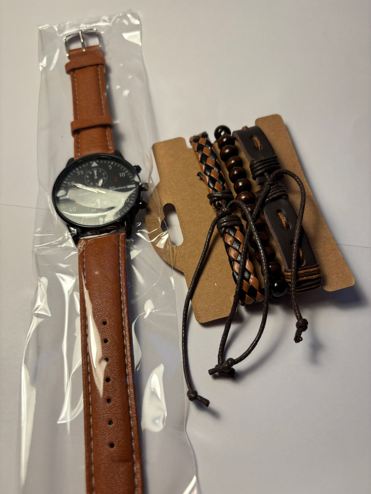Montre homme + trois bracelets cuir
