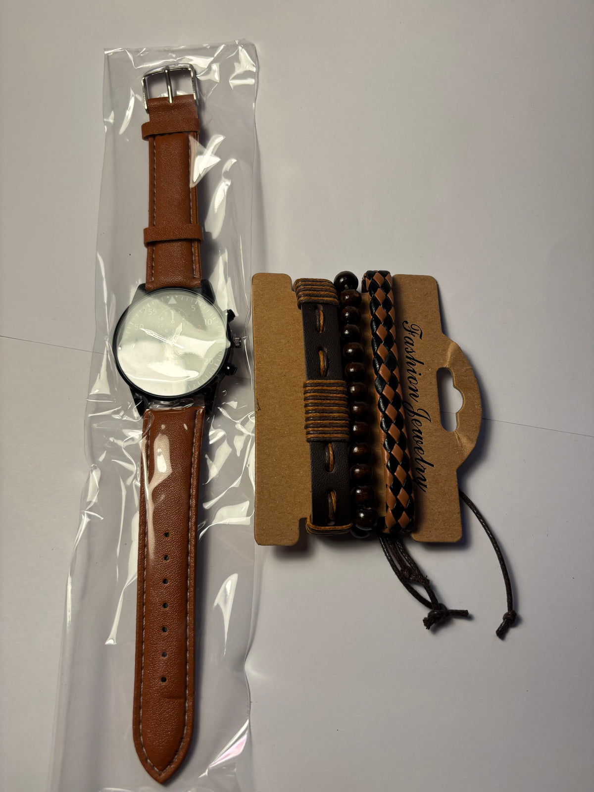 Montre homme + trois bracelets cuir