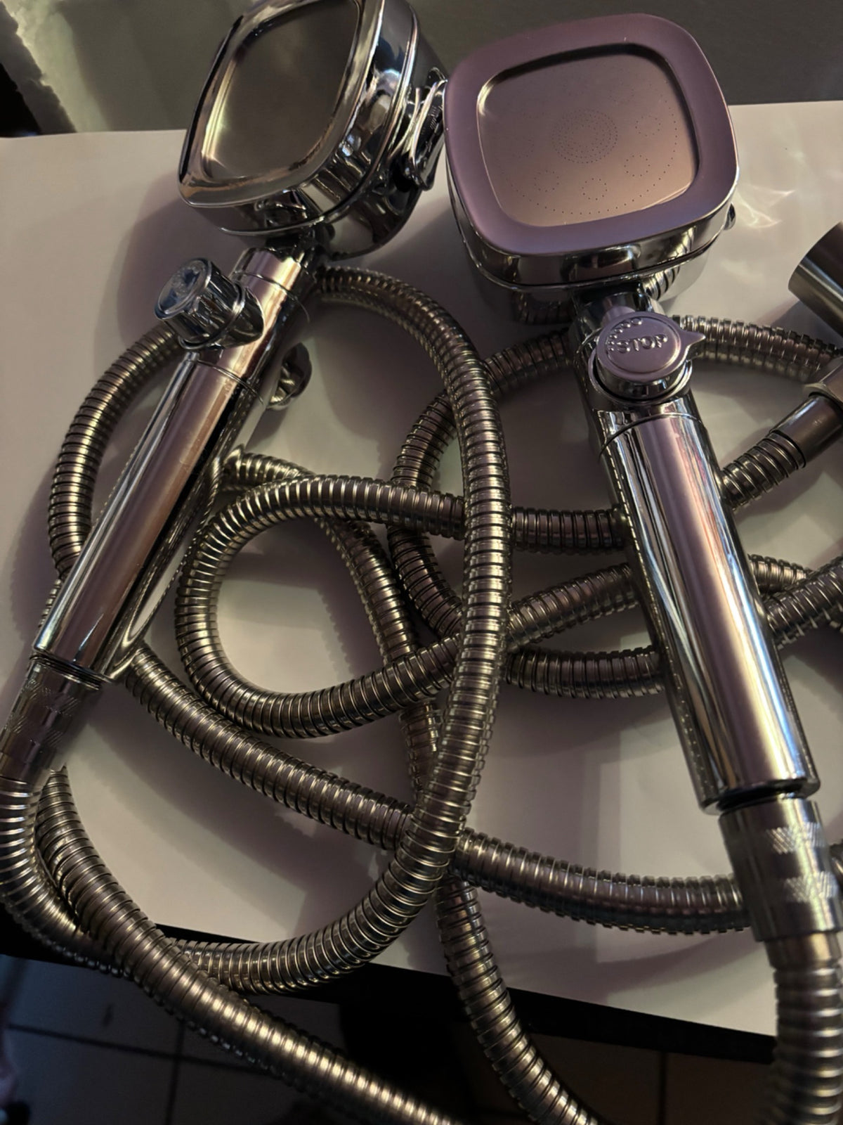 Douche en duo — 2 têtes de douche portables